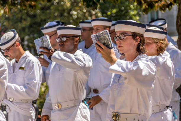 Norfolk, Virginia, USA:  April 20th 2024:  During the 75th annual NATO parade the United States military band march down the streets of Norfolk, Virginia playing their instruments.