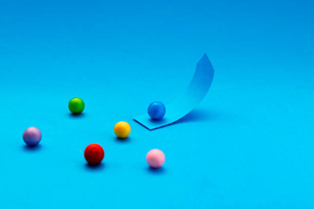 Blue sphere starting path with upward direction and others waiting to try