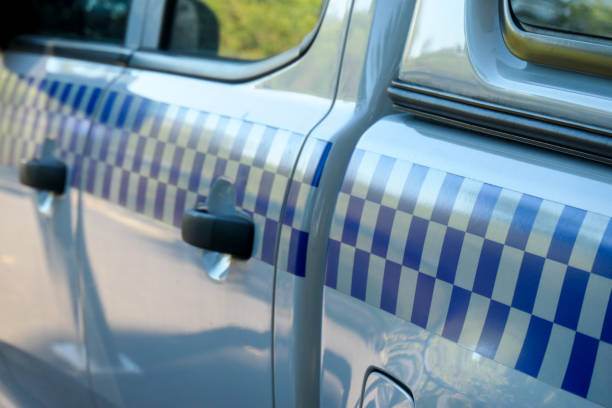 Blue police emergency light on a car roof