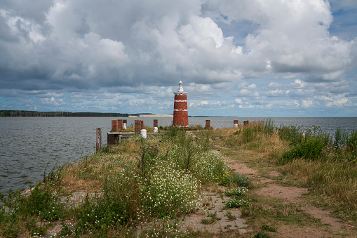 Lighthouse in the village of Rybachy on a sunny summer day, Curonian Spit, Kaliningrad region, Russia