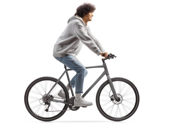 istock Guy wearing jeans and riding a bicycle 2061897923