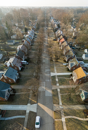 Spring comes to Detroit suburbans. Houses in a row line the main street of Royal Oak neighborhood in Michigan. Panoramic stitched image