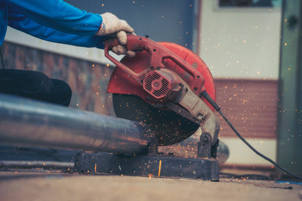 istock Men hands wear protective glove Hot flame metal work cutting fire iron workshop. Locksmith use Welding machine cut metal process. Construction Worker hands using Welding machinery iron metal sparking 2061903220