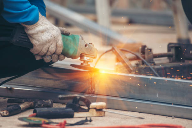 istock Men hands wear protective glove Hot flame metal work cutting fire iron workshop. Locksmith use Welding machine cut metal process. Construction Worker hands using Welding machinery iron metal sparking 2061903764