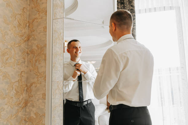 istock The groom is preparing for the wedding ceremony 2061904318