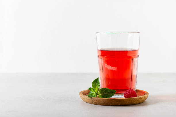 istock Raspberry drink in the glass on the light background. 2061939200