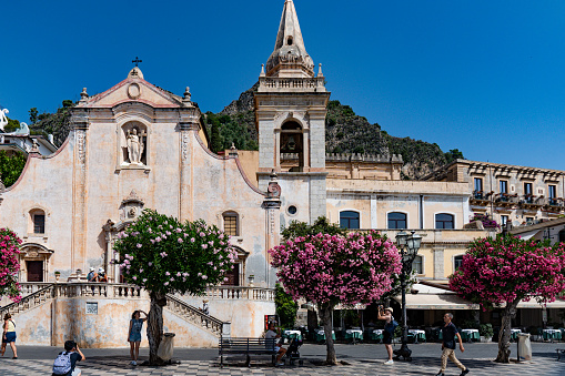 Taormina , Italy - August 9 2023: San Giuseppe Church and Belvedere and Corso Umberto street of Taormina at Main Square Piazza 9 Aprile