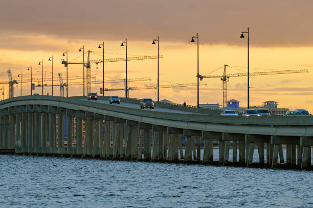 istock Barron Collier Bridge and Gilchrist Bridge in Florida with moving traffic. Transportation infrastructure in Charlotte County connecting Punta Gorda and Port Charlotte over Peace River 2062045428