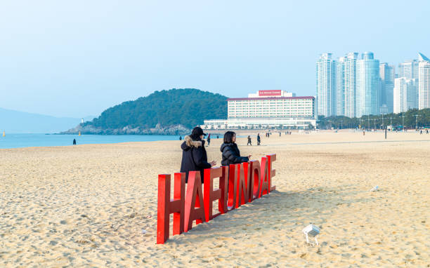 Tourists are  enjoying to observing scenery in Haeundae beach, Busan, South Korea, on Friday  March 01, 2019