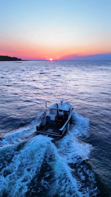 Maine Sunrise: Fishing Boat Illuminate Coastal Waters