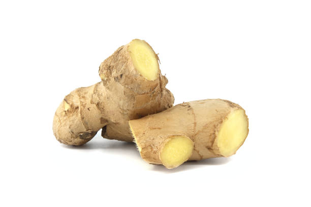 istock Pieces of fresh ginger placed against white background 2062130073