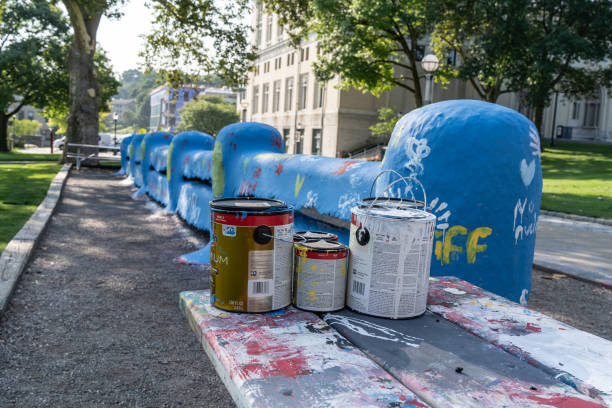 Pittsburgh, Pennsylvania  July 23, 2023: The Fence on Carnegie Mellon University campus is painted by students to displays messages.