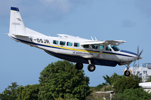 St Barth Commuter Cessna 208B Grand Caravan commuter plane landing at the Princess Juliana International Airport, St. Maarten, Netherlands Antilles (SXM/TNCM), 15-Jan-2024