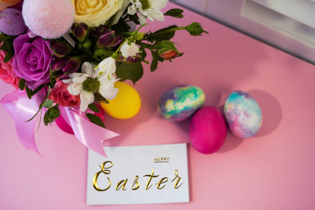 Happy easter! Flat Lay, Internet banner, postcard on Easter.  Bouquet of flowers and Easter eggs