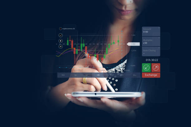 istock businesswoman smiling and working on tablet computer 2062235042