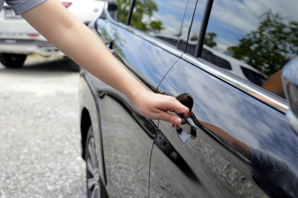 istock Male hand opening car door 2062236986