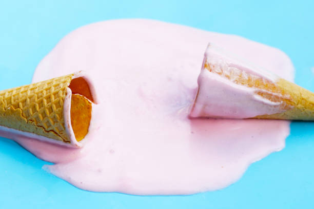 istock Melting ice cream on blue background. 2062246350