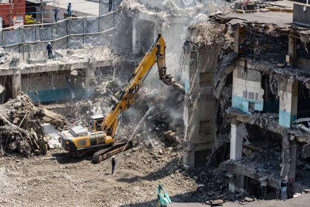 istock Building demolition work site with power shovel 2062311946