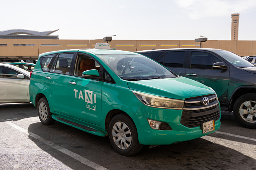Riyadh, Saudi Arabia - February 25, 2024 : Taxi in King Khalid International Airport, Riyadh, Saudi Arabia.