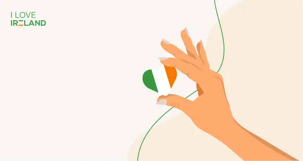 Vector illustration of A woman's hand holds a heart with the IRELAND flag I love IRELAND . Ireland national day banner, background. Celebration of St Patrick's Day Vector Illustration
