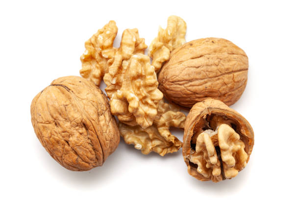 istock Top view of Organic cracked Walnuts (Juglans regia), isolated on a white background. 2062418828