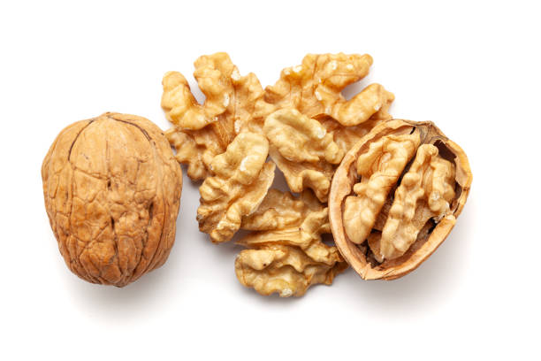 istock Top view of Organic cracked Walnuts (Juglans regia), isolated on a white background. 2062418837
