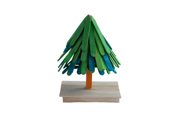 Christmas tree made from colorful popsicle sticks isolated on a white background included clipping path. It's creativity and imagination.