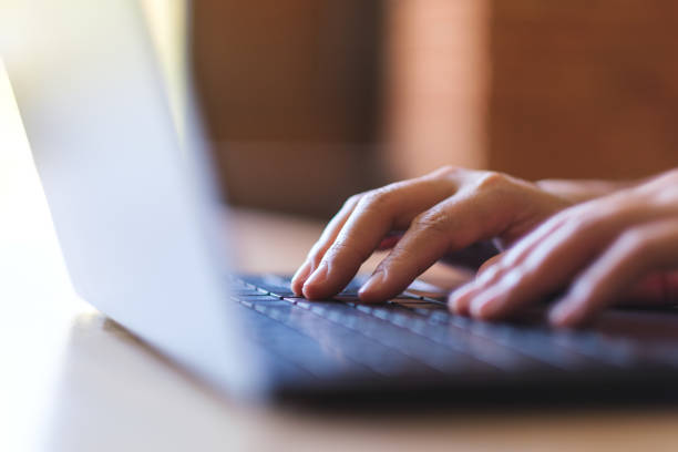 istock Closeup image of hands typing on laptop computer keyboard 2062448792