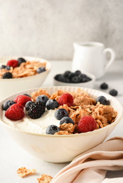 istock Breakfast with yogurt cereals and berries. 2062482427