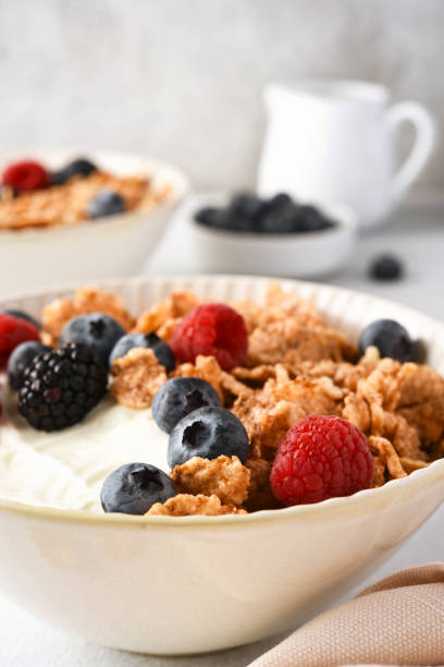 istock Breakfast with yogurt cereals and berries. 2062482435