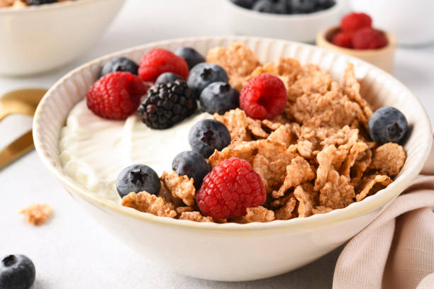 istock Breakfast with yogurt cereals and berries. 2062482437