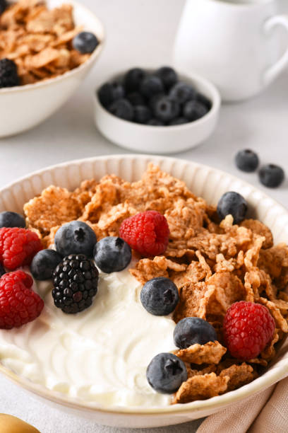 istock Breakfast with yogurt cereals and berries. 2062482438