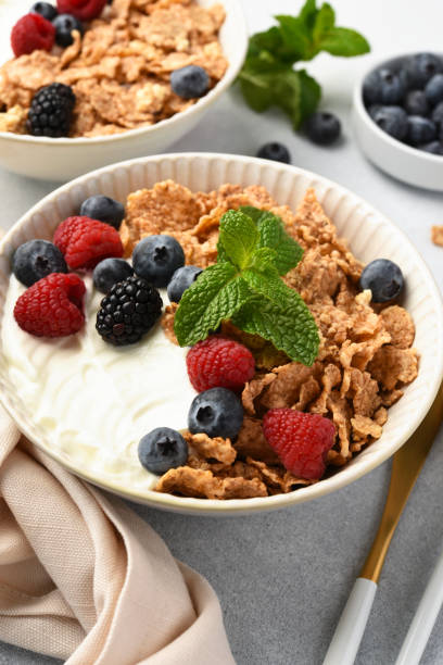 istock Breakfast with yogurt cereals and berries. 2062482957