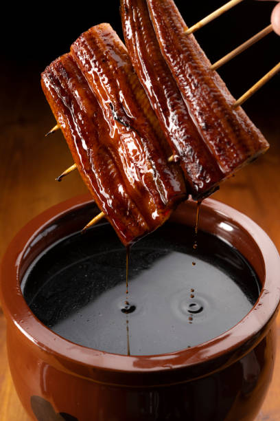 Dipping Eel Kabayaki in Secret Special Sauce