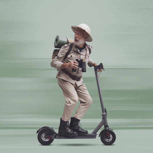 istock Scared explorer on electric scooter being chased by a monster 2062510397