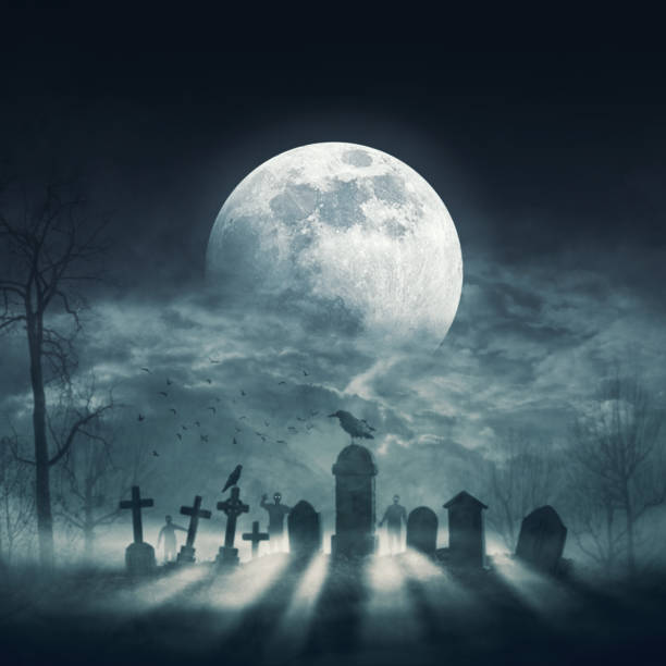 istock Zombies in the creepy cemetery and moon 2062515124