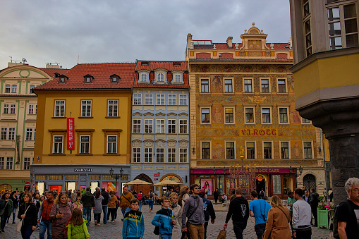 Prague, Czech Republic - October 7, 2023: Facade of the famous VJ Rott House (Dum U Rotta) and other buildings in the Old Town of Prague. Numerous tourists walk in the historical center of Prague.