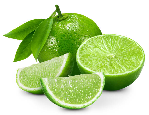 Lime fruit slices and lime leaves isolated white