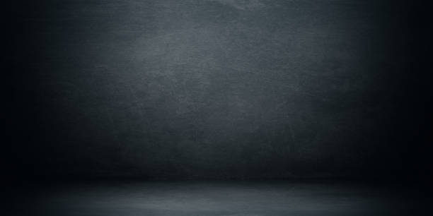 istock Empty dark concrete wall room studio background and floor perspective with blue soft light well editing displays product and text present on free space cement backdrop 2062535105