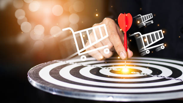 istock Businessman throwing red arrow dart to  target dart board. Setup objectives and target for business investment concept. business investment objective concept Marketing strategies and goals for success 2062558623