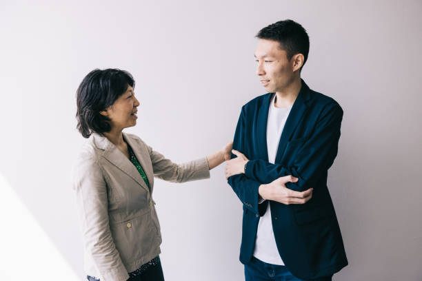 istock Japanese colleagues having a friendly chat 2062600050