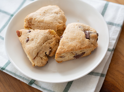 Chocolate and nut scones on plate