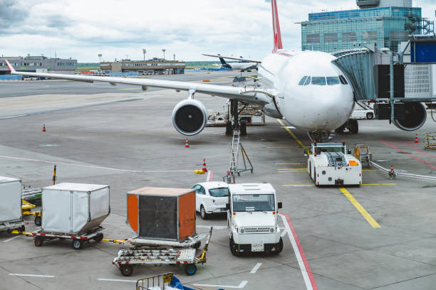 istock Airplane on the boarding gate, connected to boarding tunnel 2062622885