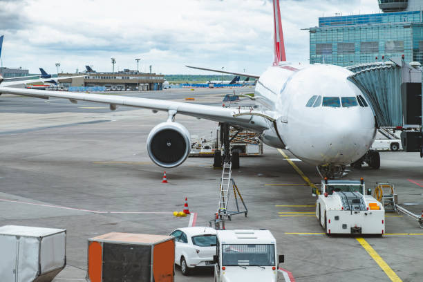 istock Airplane on the boarding gate, connected to jet bridge 2062622890