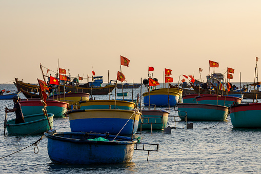 Mui Ne, Binh Thuan, Vietnam - December 23, 2019: Fishing Boats in the Harbor of Mui Ne in Vietnam