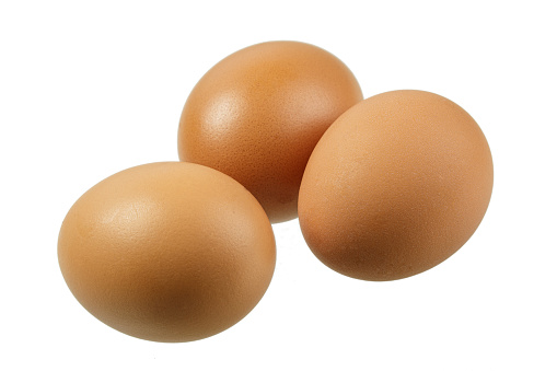 Close up of delicious Brown Eggs isolated on a white background with copy space