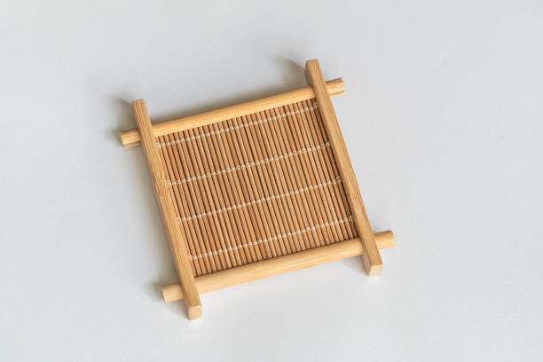 istock Sushi bamboo trays isolated 2062704106