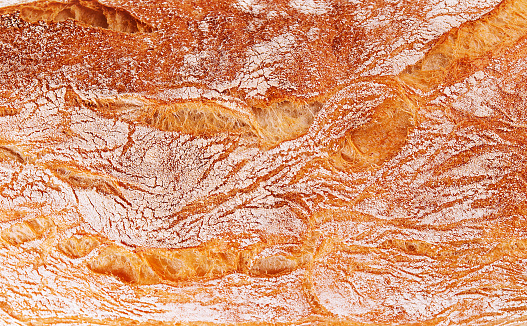 Crusty loaf of sourdough bread close up