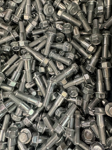 A closeup of large manufacturer bolts.