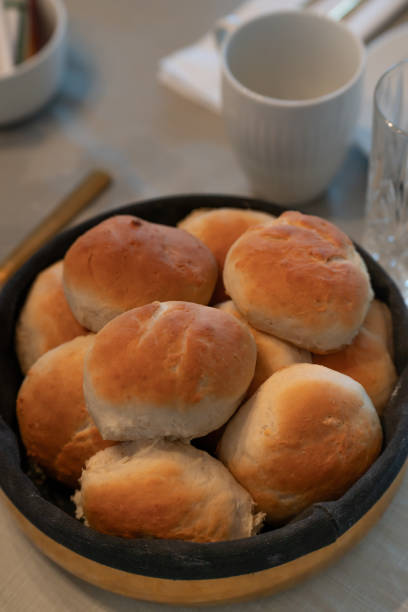 istock Authentic home made pastry buns made for birthday guests served in modern breadbasket 2062734159